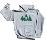 Gray hoodie with green graphic of a forest and Bigfoot on a white background