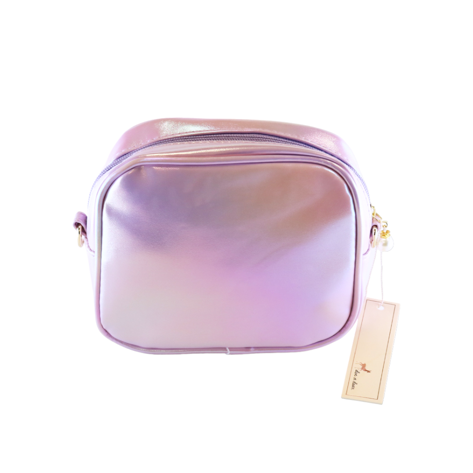 Purple cosmetic bag with a visible brand tag on a white background