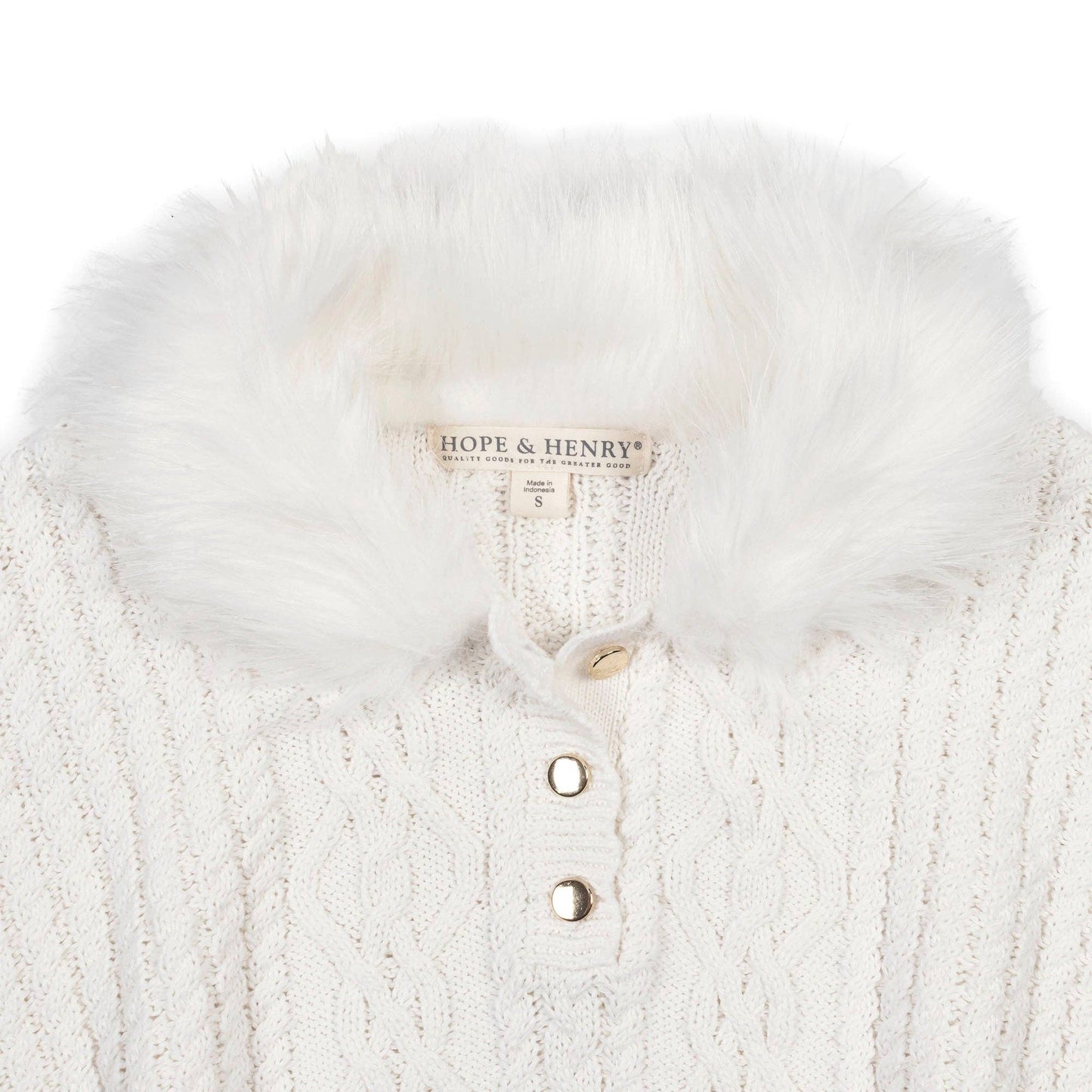 White knitted cape with fur trim and 'Hope & Henry' label on a white background