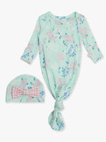 Mint green floral baby knotted gown and matching hat on a white background